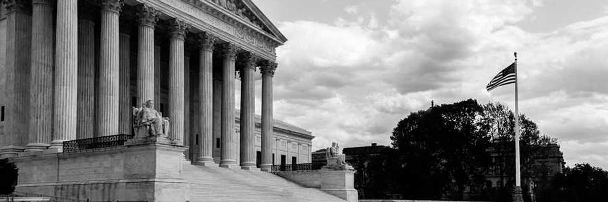 Black and white photo of the Supreme Court of the U.S.