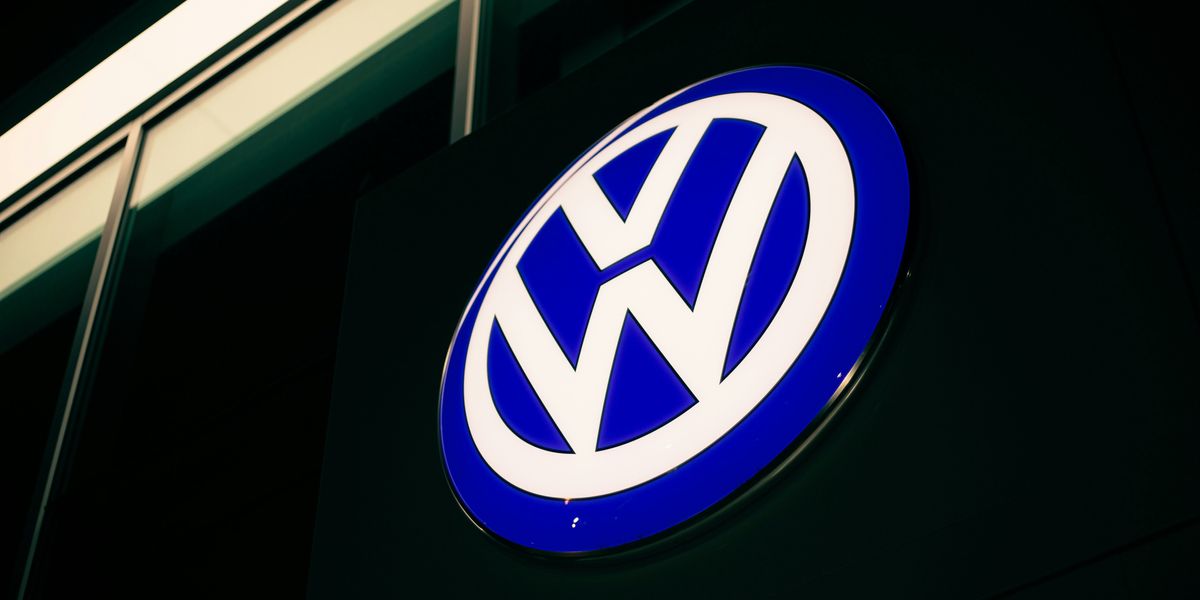 Blue and white Volkswagen logo.