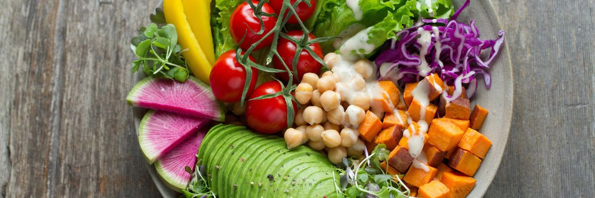 Bowl of vegetables with avocado and garbanzo beans