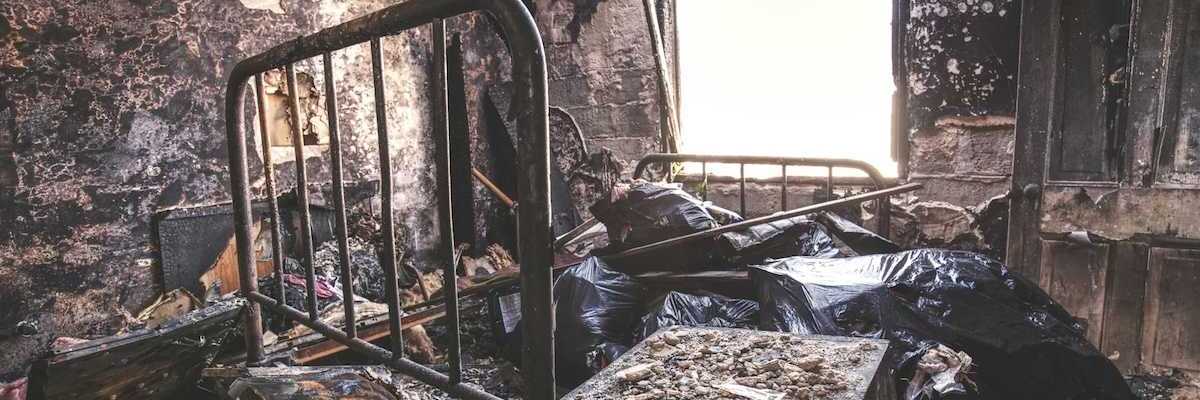 Burned-out room post-fire aftermath