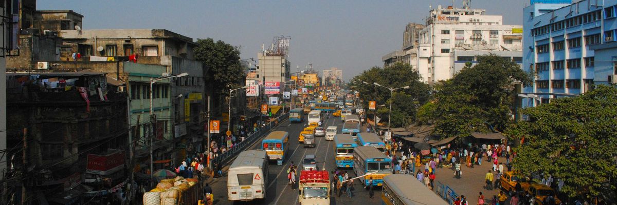 cars on road near buildings during daytime