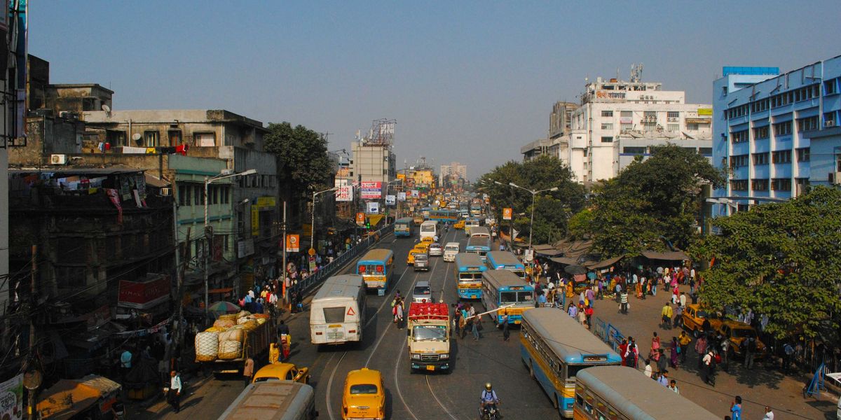 cars on road near buildings during daytime