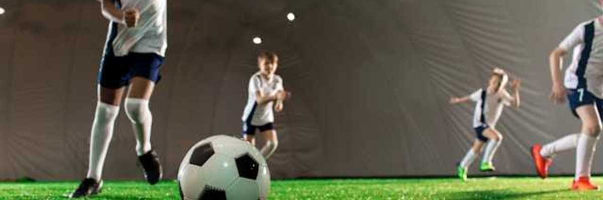 Children playing soccer