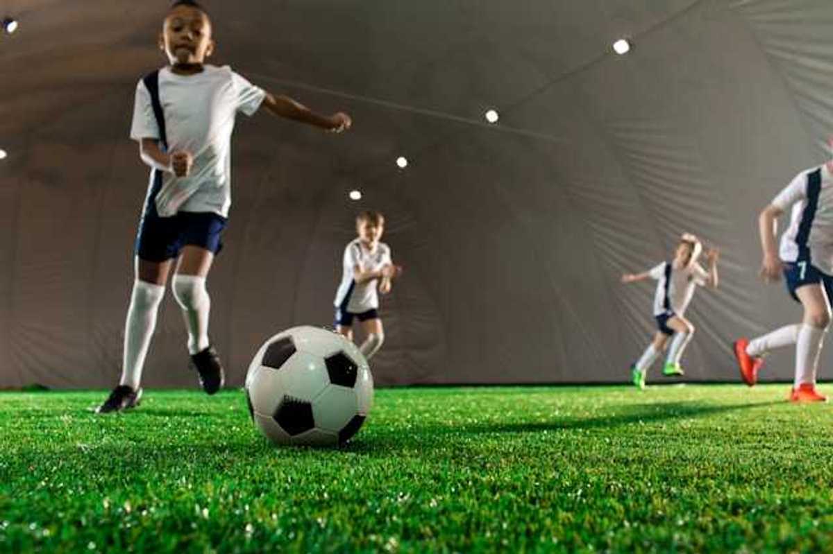 Children playing soccer