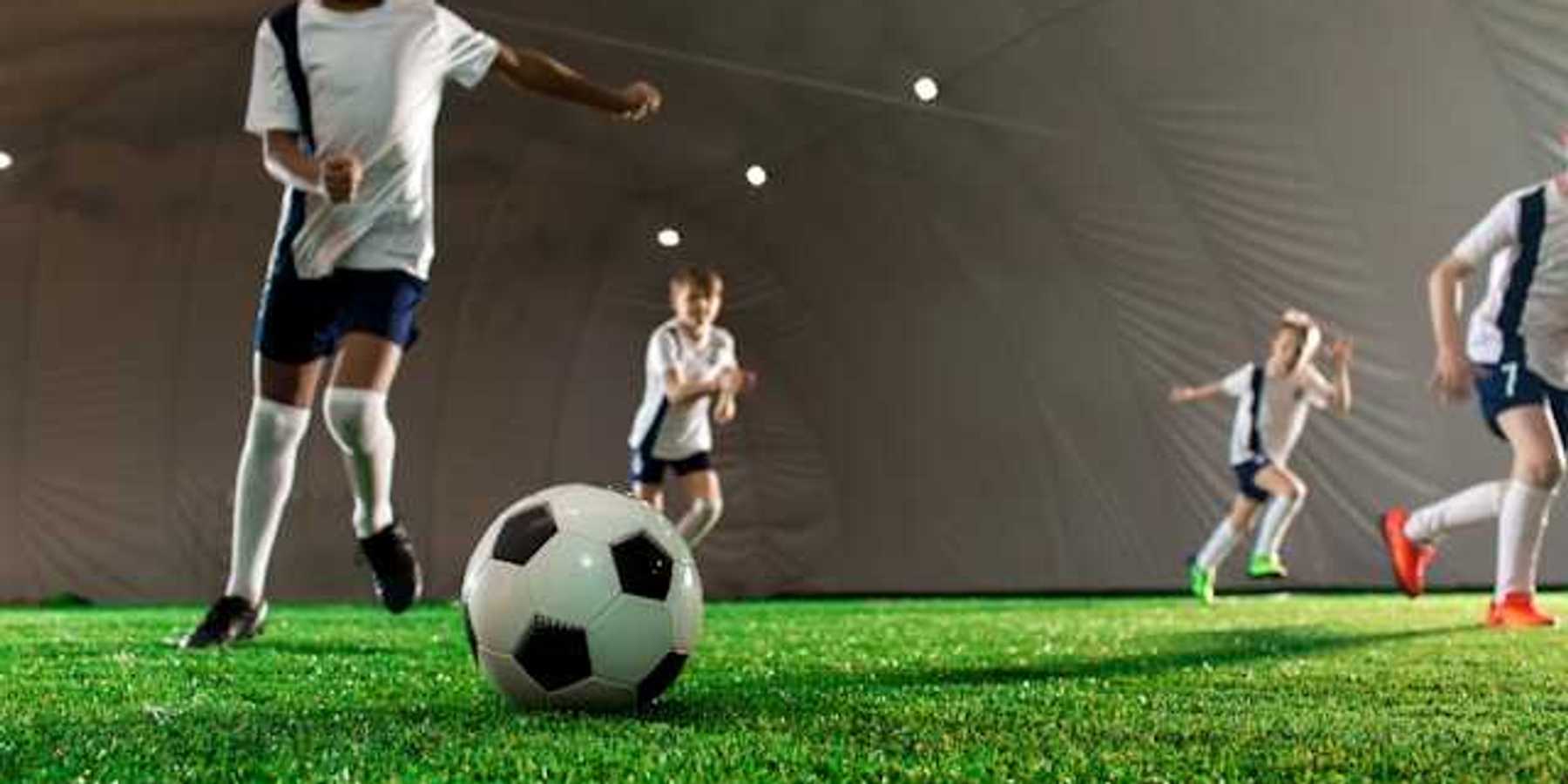 Children playing soccer