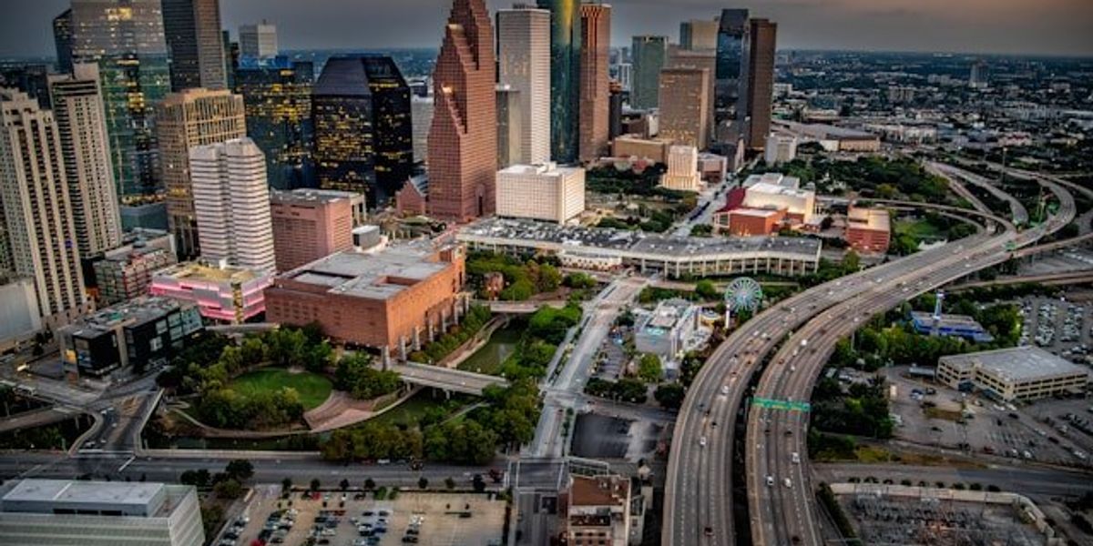 City skyline with freeways winding through downtown.