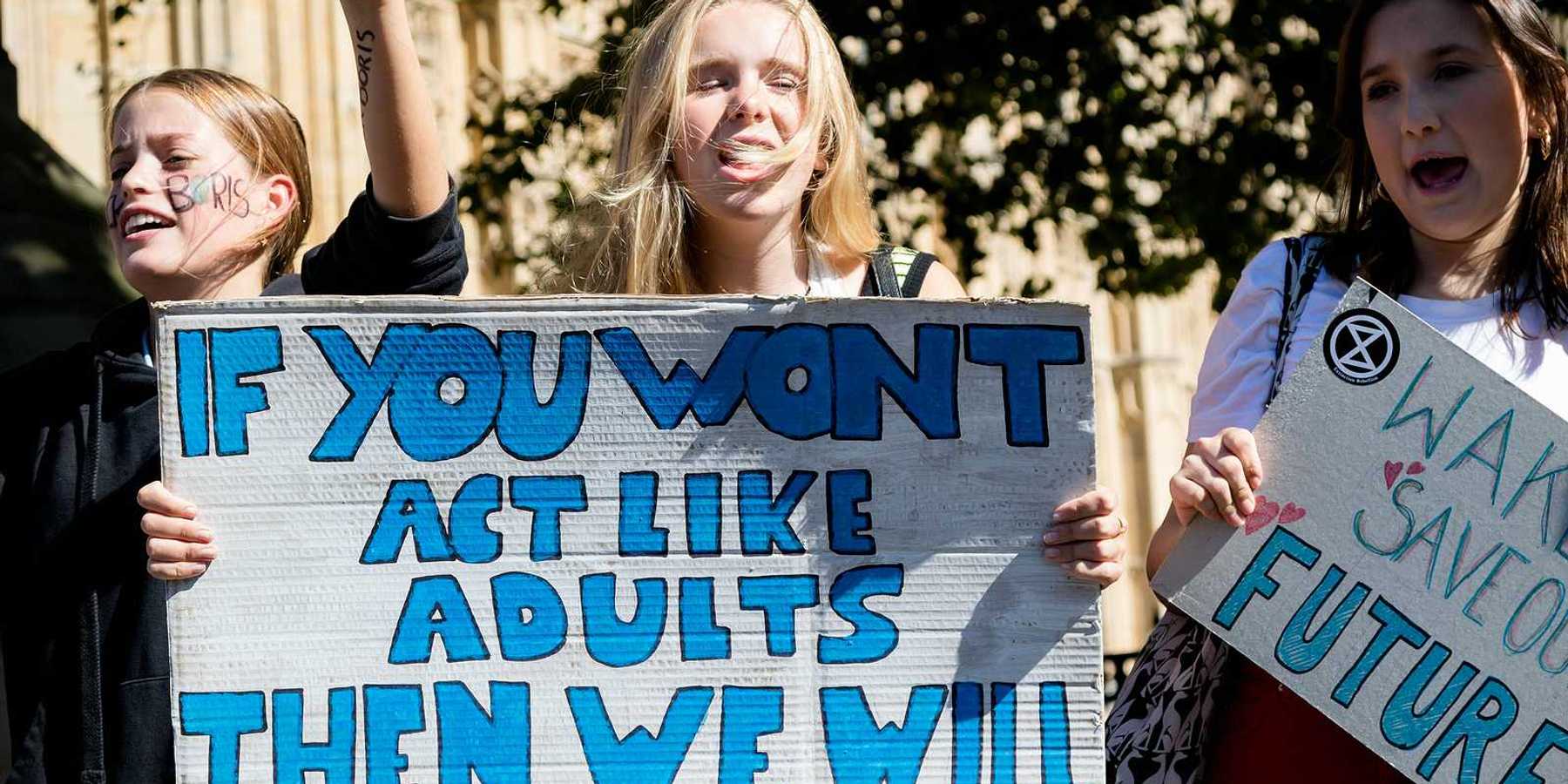 Climate Change Protesters gather in Westminster, central London near the British Parliament as part of a global day of protest.
