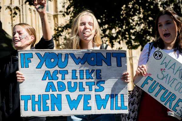 Climate Change Protesters gather in Westminster, central London near the British Parliament as part of a global day of protest.