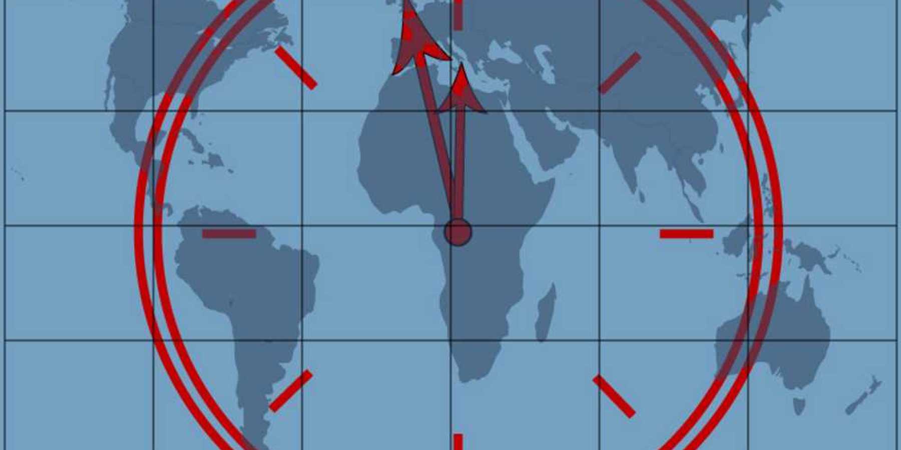 Clock approaching midnight superimposed over a world map