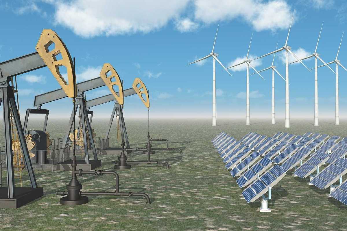 Computer generated 3D illustration with oil pumps, solar panels and wind turbines.