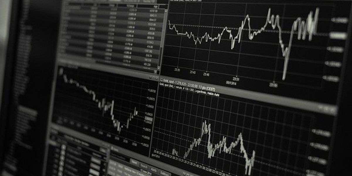 Computer screen with line graphs monitoring stock market activity.