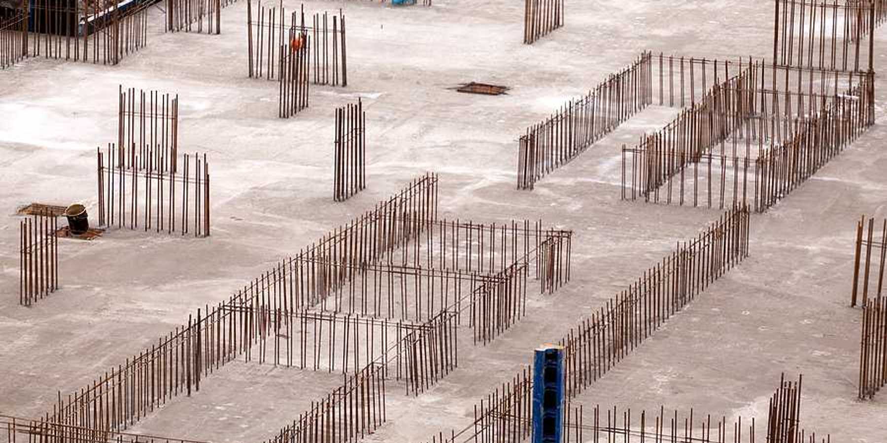 Construction of the foundation of a building with concrete and metal rebar