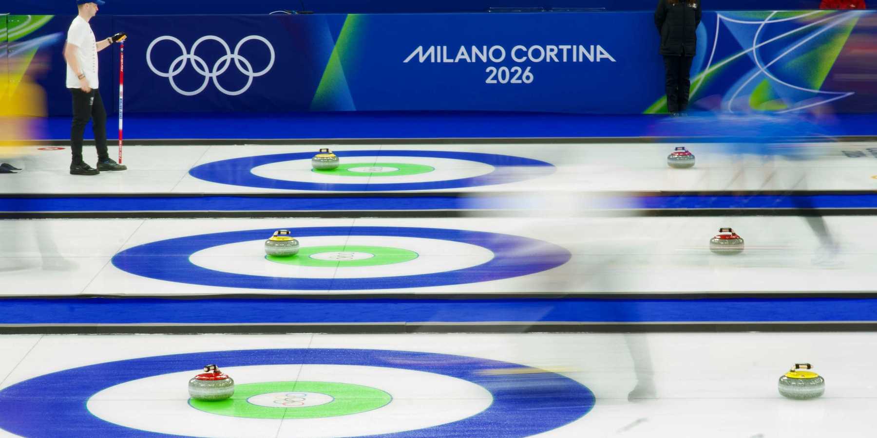 Curling match at Cortina Winter Olympics 2026 with athletes sliding stones on ice and fans in stands behind.