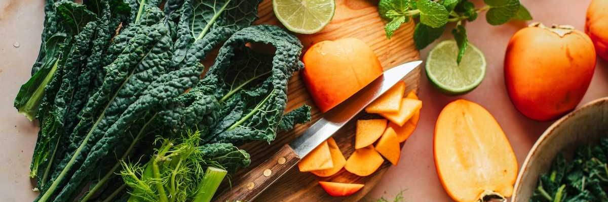 Cutting board adorned with fresh vegetables and fruit