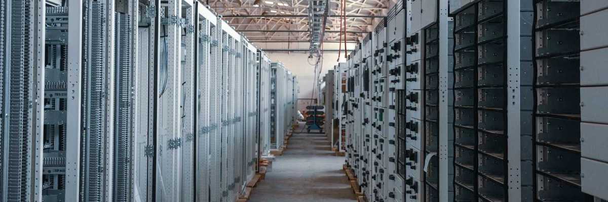 Data Center corridor lined with racks and racks of electronics