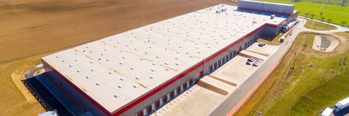 Data center in a rural setting of green fields and farmland