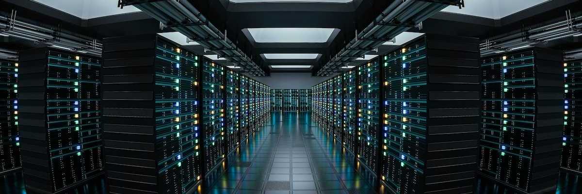 Data repository depicted by a long corridor lined with racks of tech