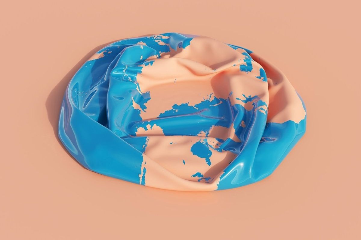 Deflated "earth" plastic beachball .