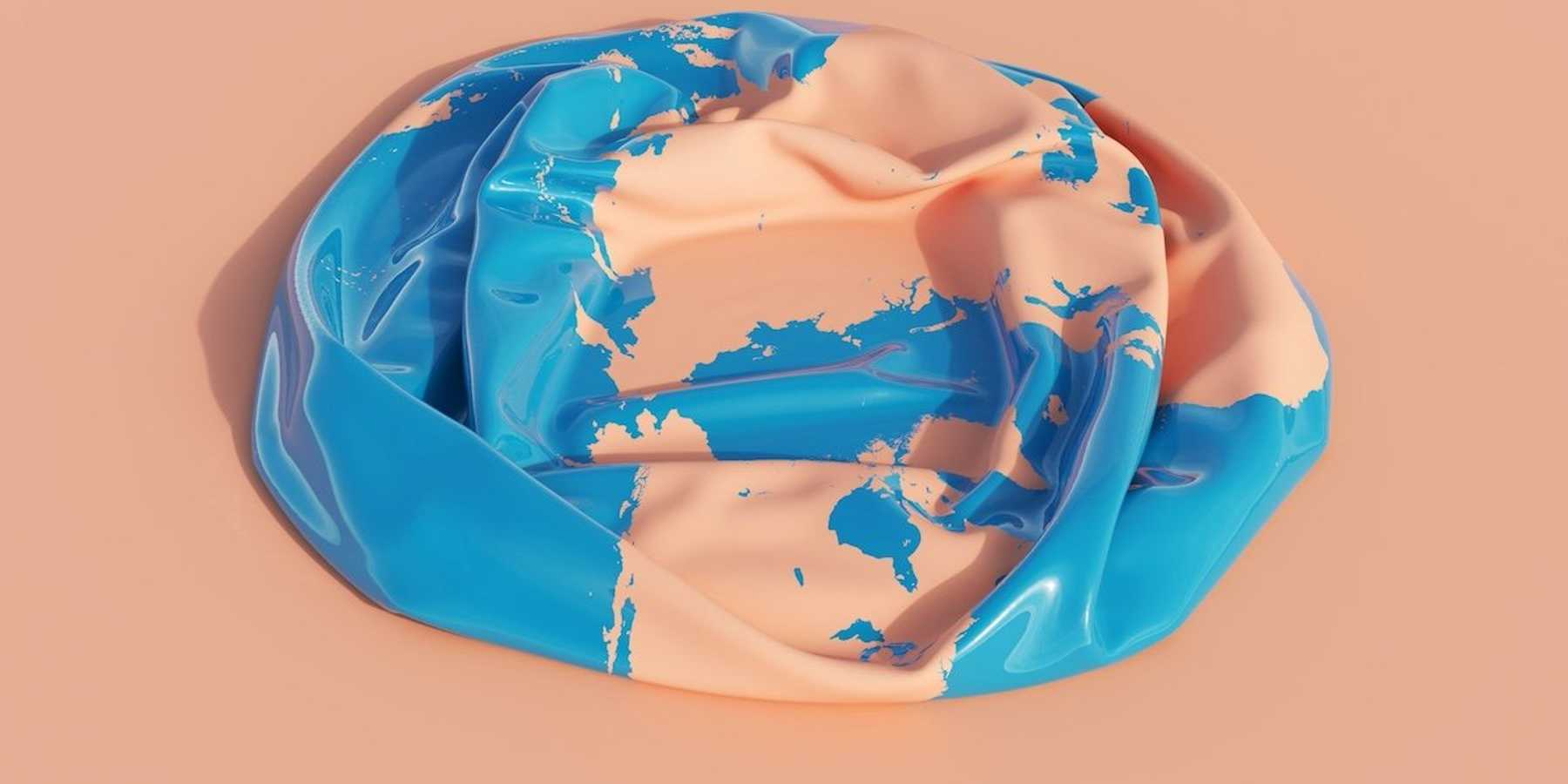 Deflated "earth" plastic beachball .