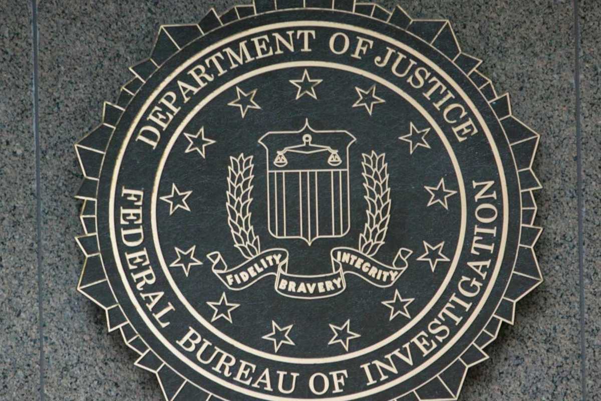 Department of Justice/FBI sign with DOJ seal "Fidelity, Bravery, Integrity"