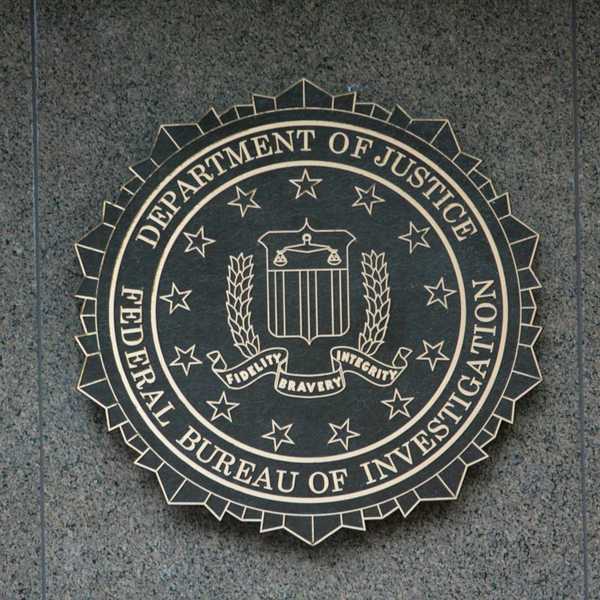 Department of Justice/FBI sign with DOJ seal "Fidelity, Bravery, Integrity"