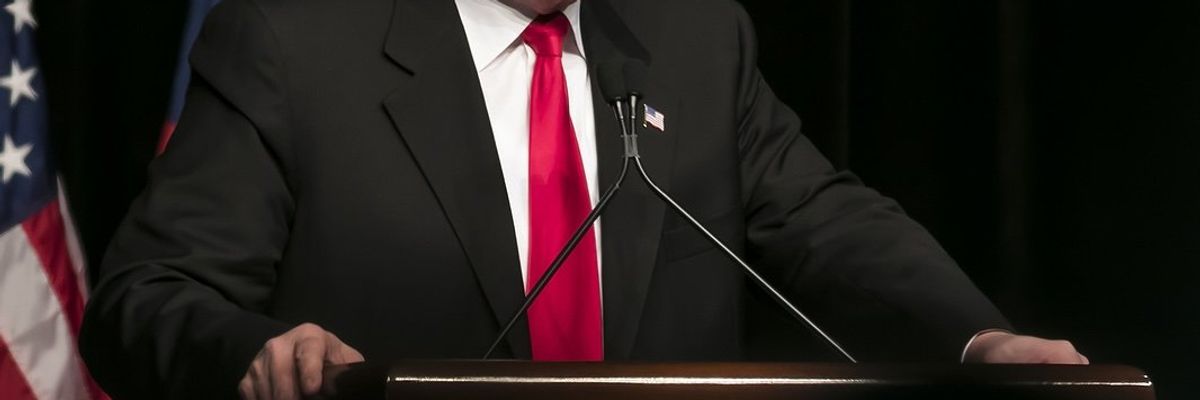 Donald Trump speaking at lectern