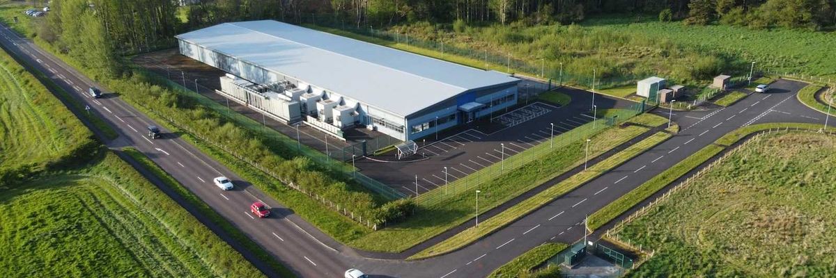 drone phot of large data center in rural setting