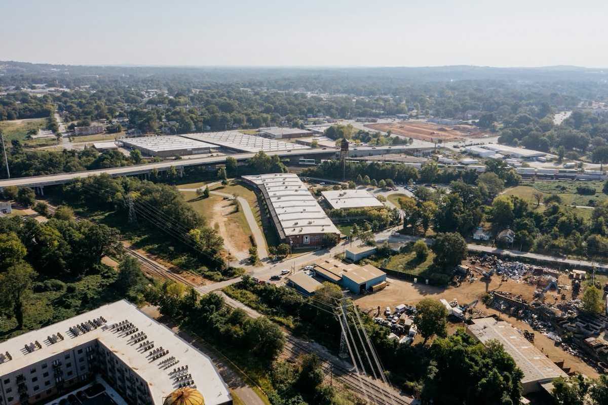 Drone shot of industrial buildings in a rural/urban area