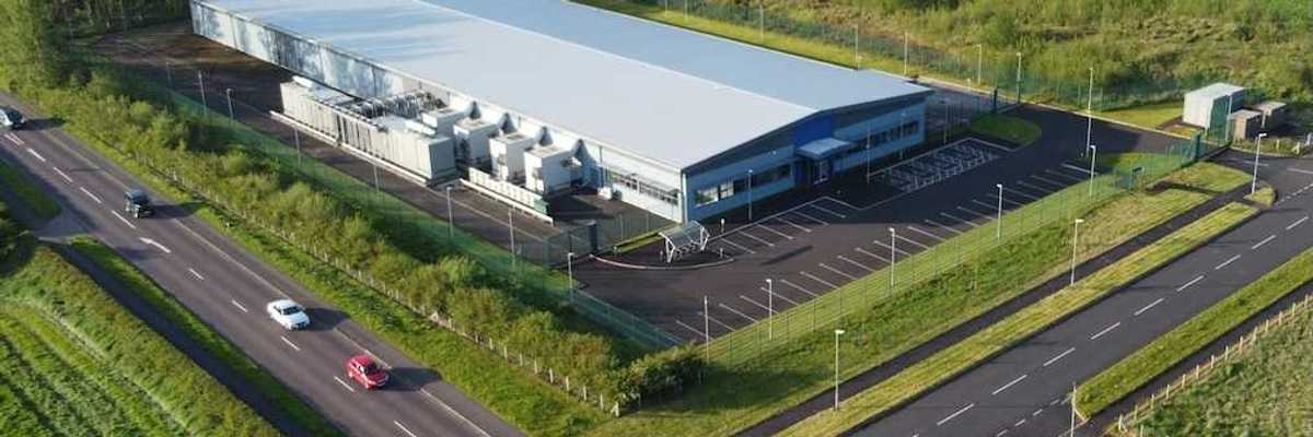 Drones-eye view of a data center sited in rural farm country