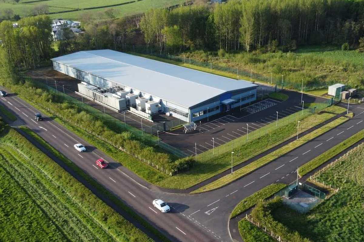 Drones-eye view of a data center sited in rural farm country