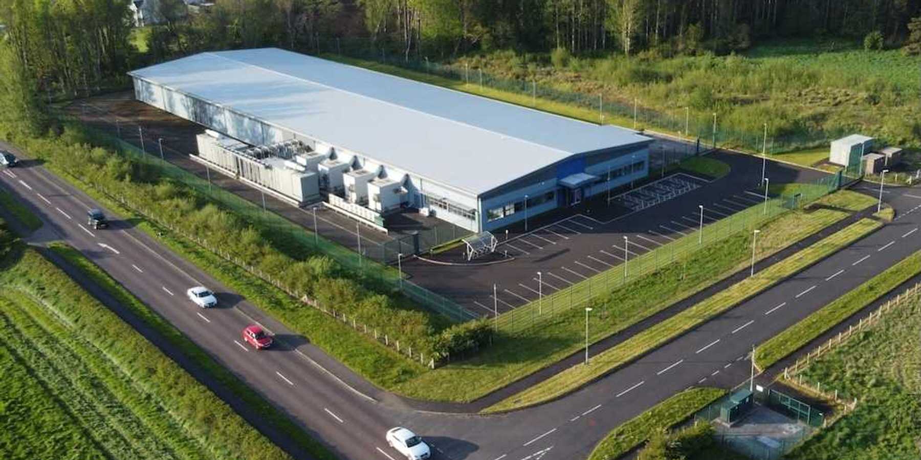 Drones-eye view of a data center sited in rural farm country