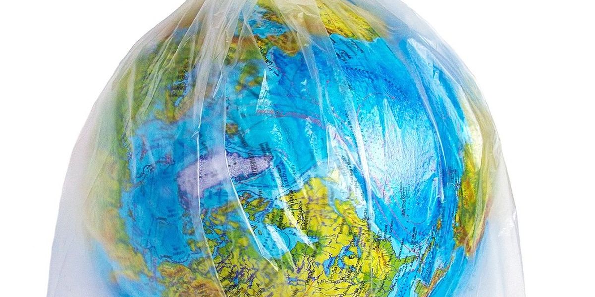 Earth depicted as a globe encased in a plastic bag.