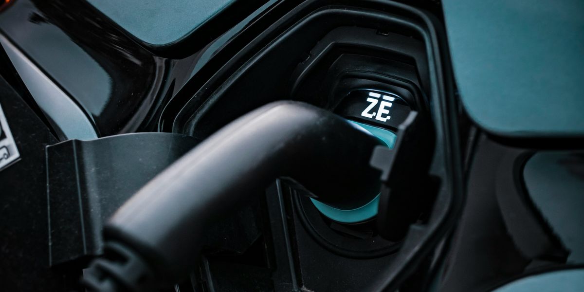 Electric vehicle being charged.