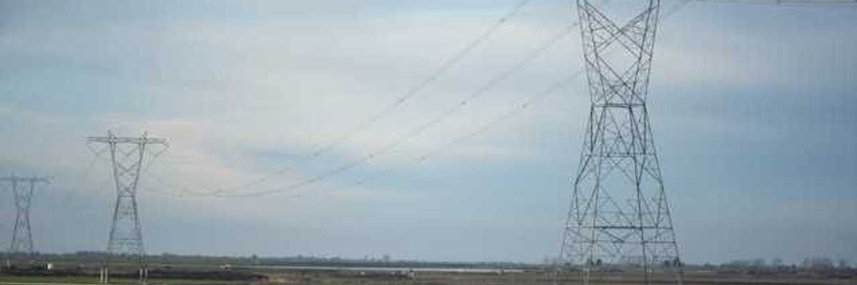 Electricity towers stretching into the distance