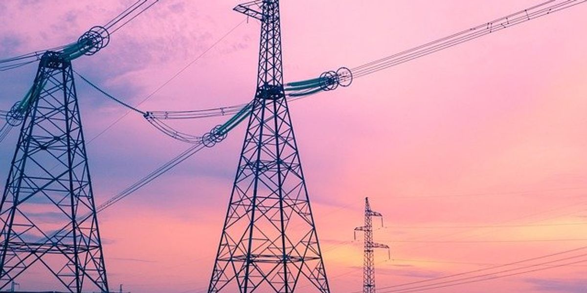 Electricity towers with wires stretch between them.
