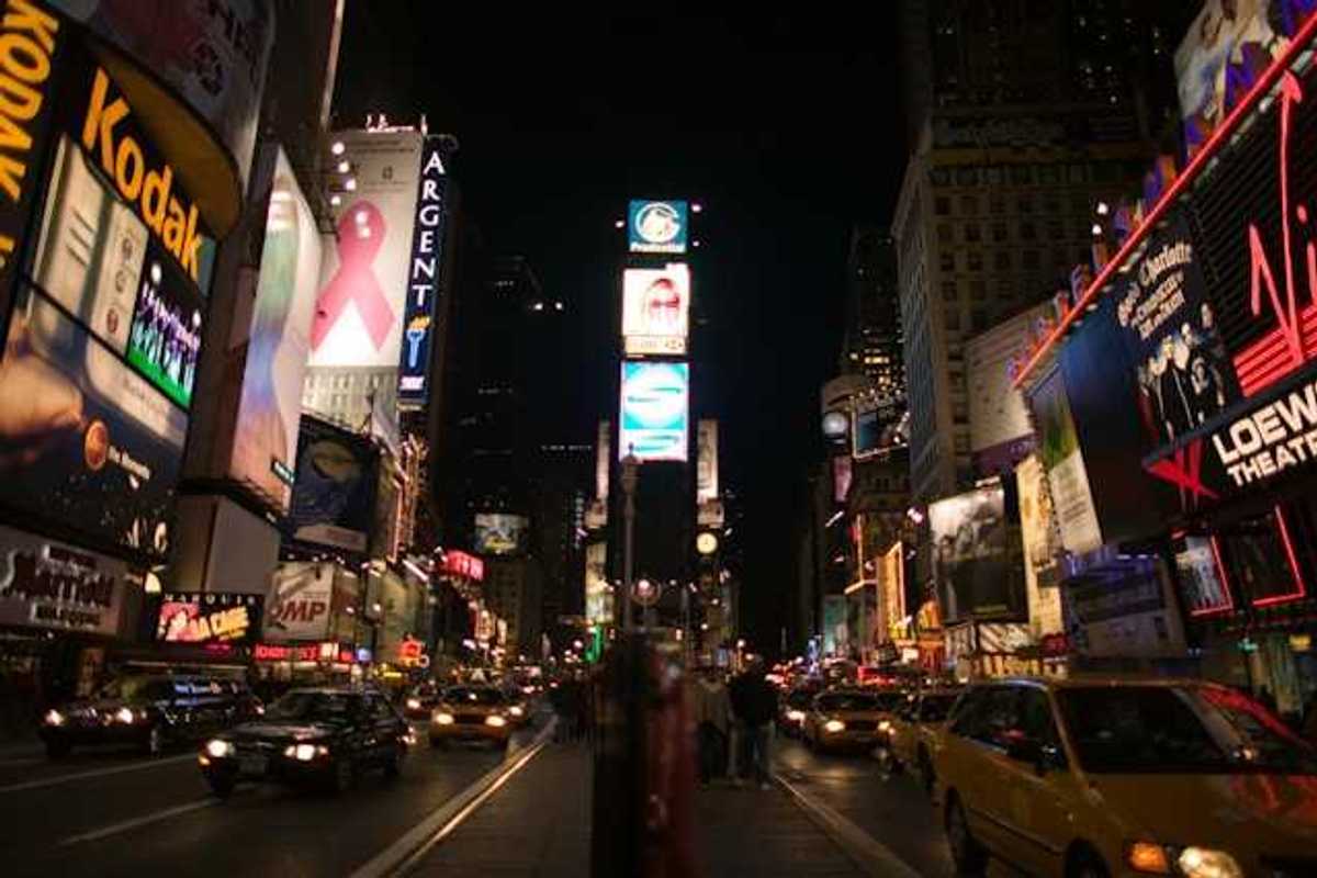 Electronic billboards on tall buildings in the center of a city