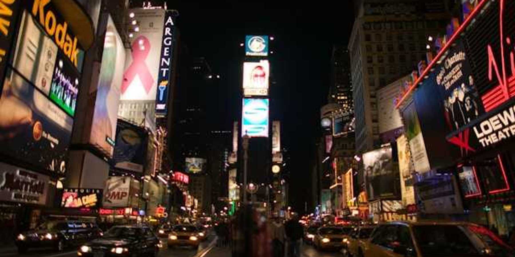 Electronic billboards on tall buildings in the center of a city