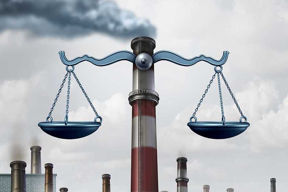 Environmental law symbol as an industrial smoke stack shaped as a justice scale as a metaphor for pollution regulations and clean air legislation.