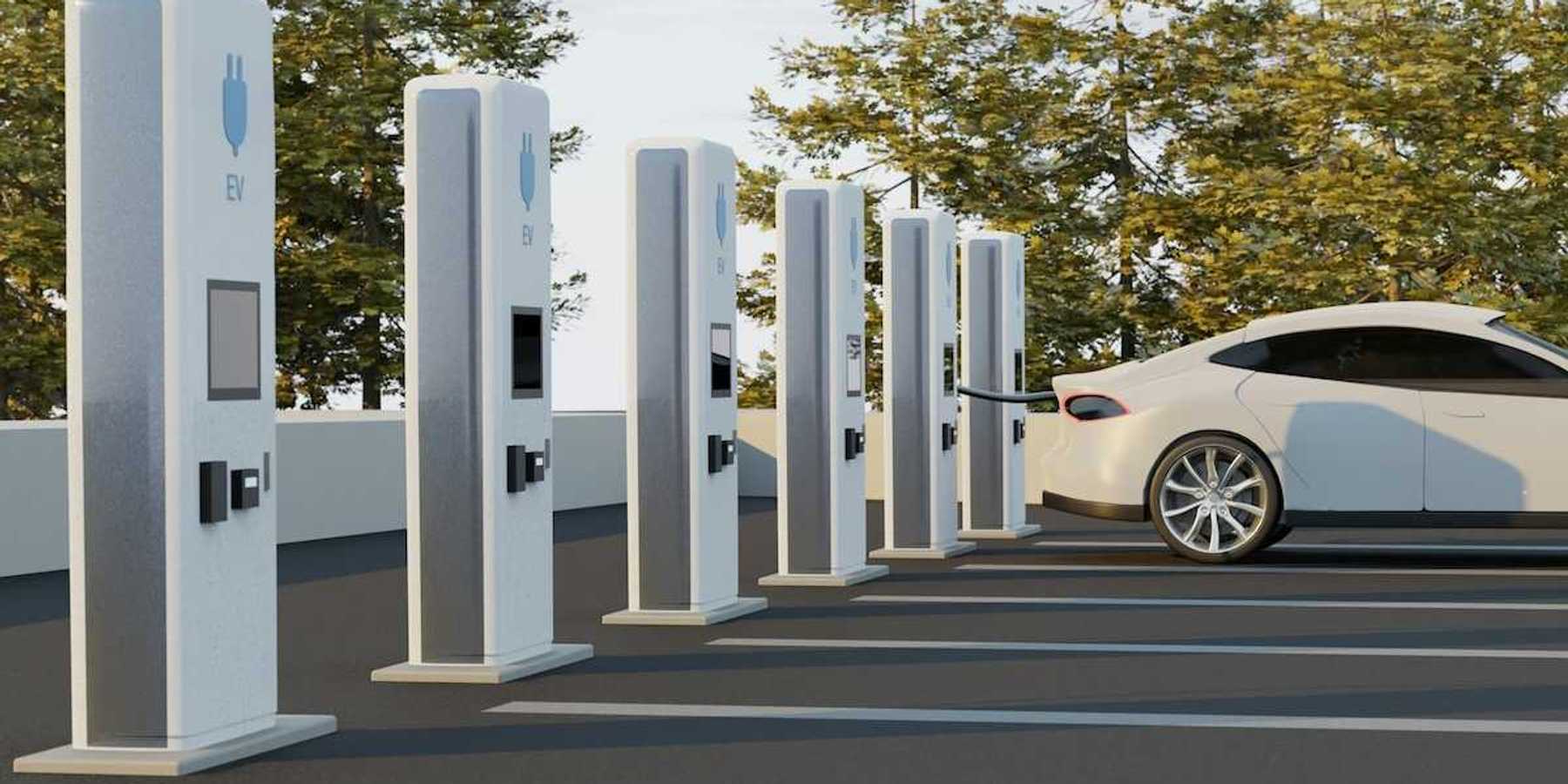 EV charging stations with one car being charged and five unused stations