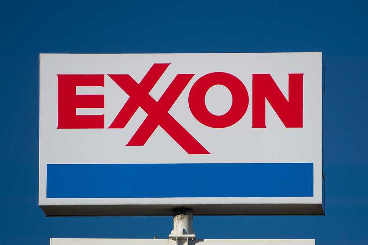 EXXON sign against blue-sky background