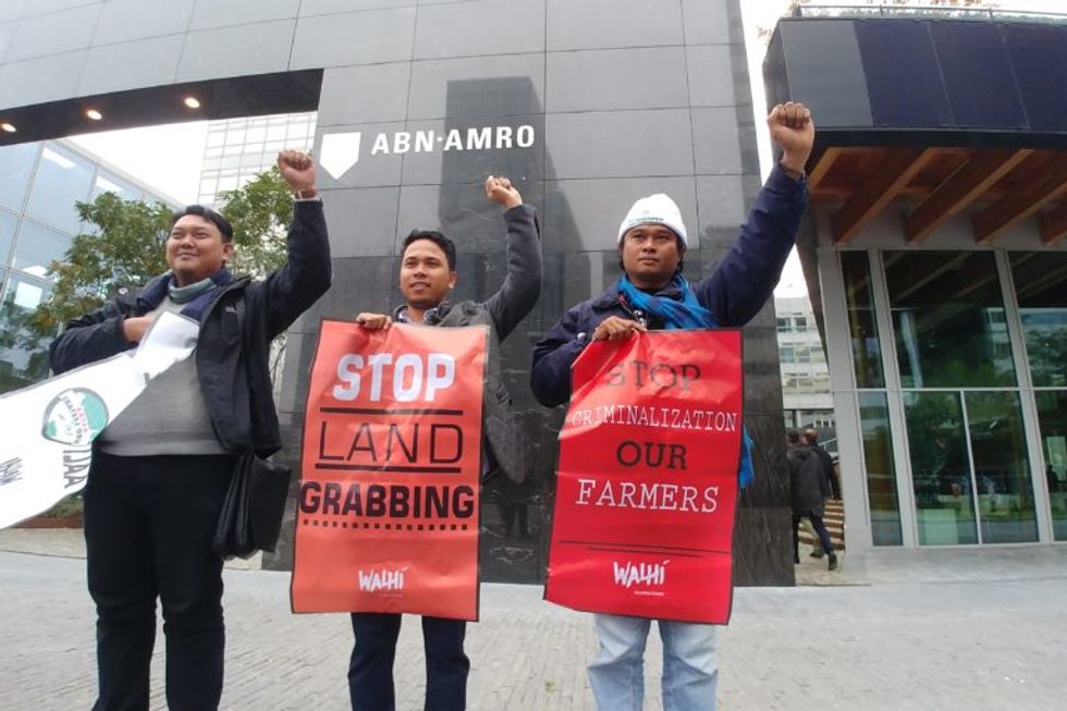 Seeking justice against palm oil firms, victims call out banks behind them