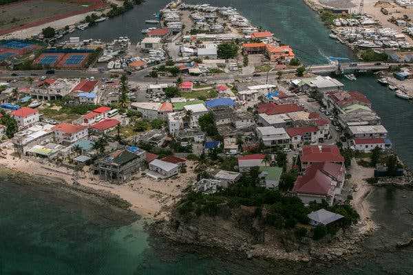 After a Caribbean hurricane, the battle is where, or even whether, to rebuild