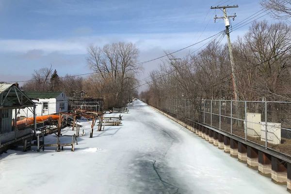 In flooded Michigan neighborhoods, who should pay for sea walls?