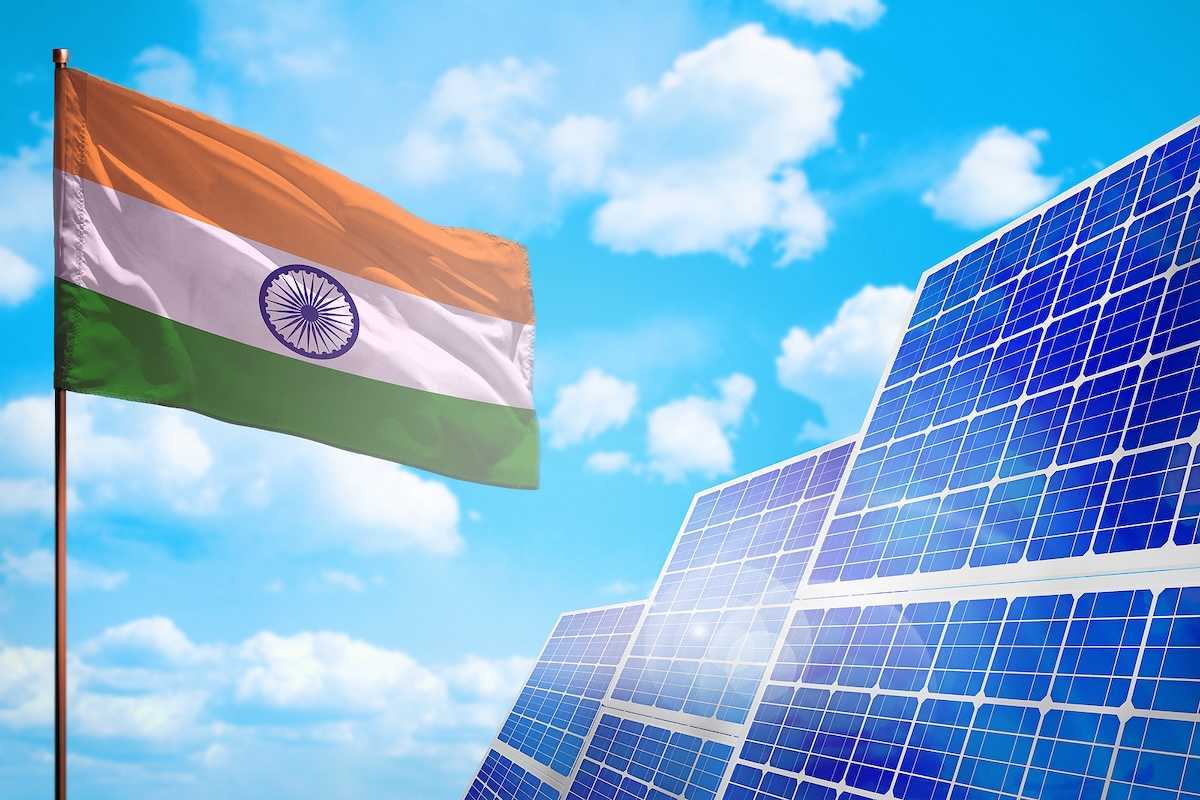 Flag of India juxtaposed with solar panels