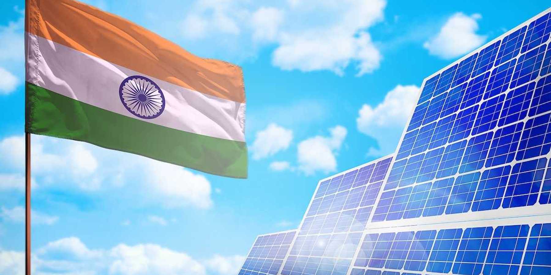 Flag of India juxtaposed with solar panels