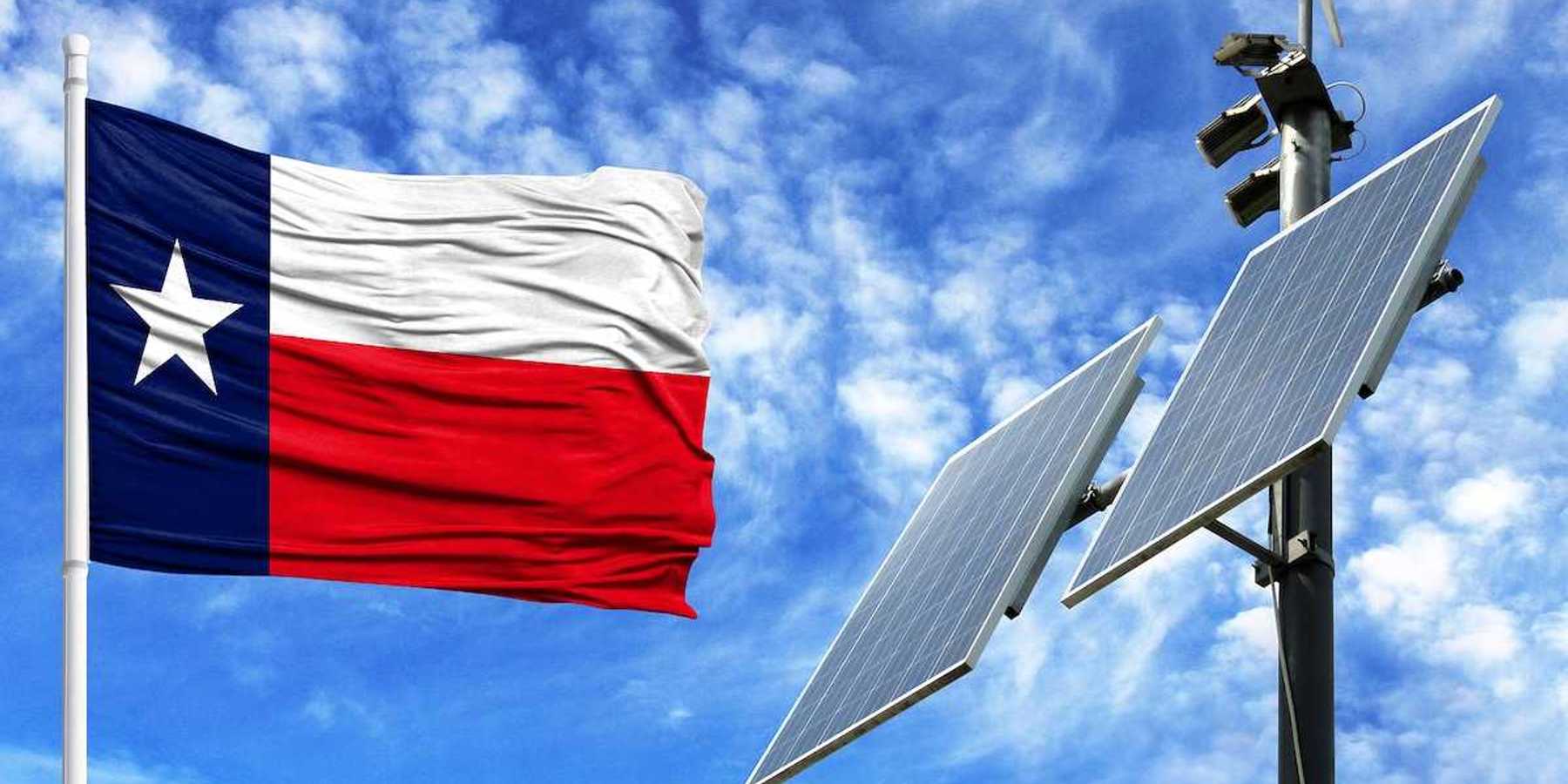 Flag of Texas adjacent to solar panels