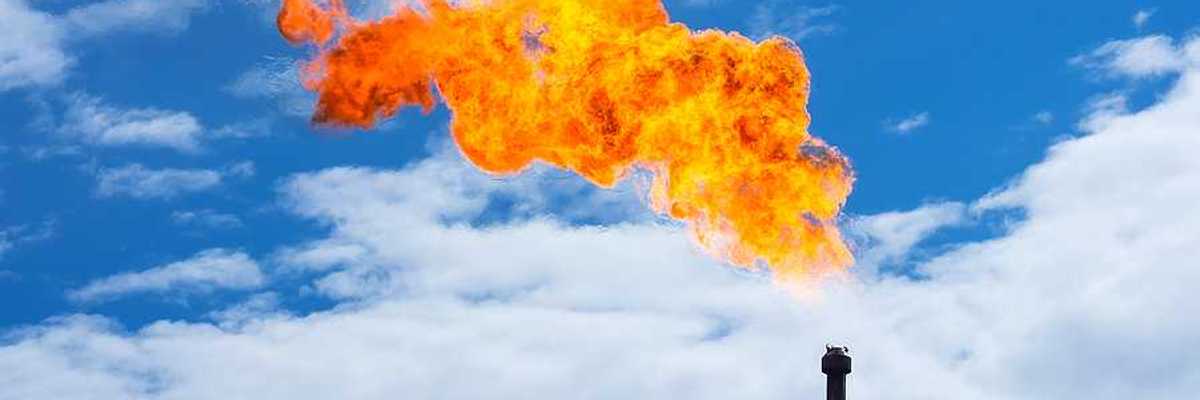 Flaring (burning off) of excess methane at oil and gas well