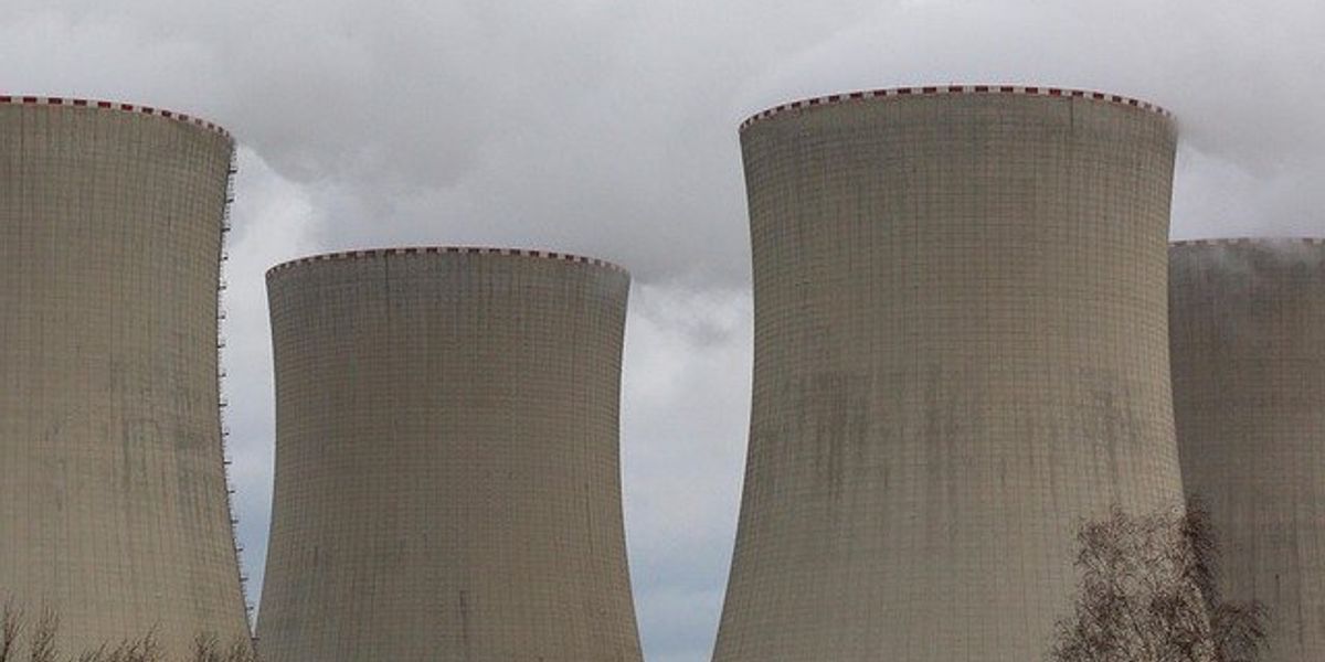 Four towers in a nuclear energy plant.