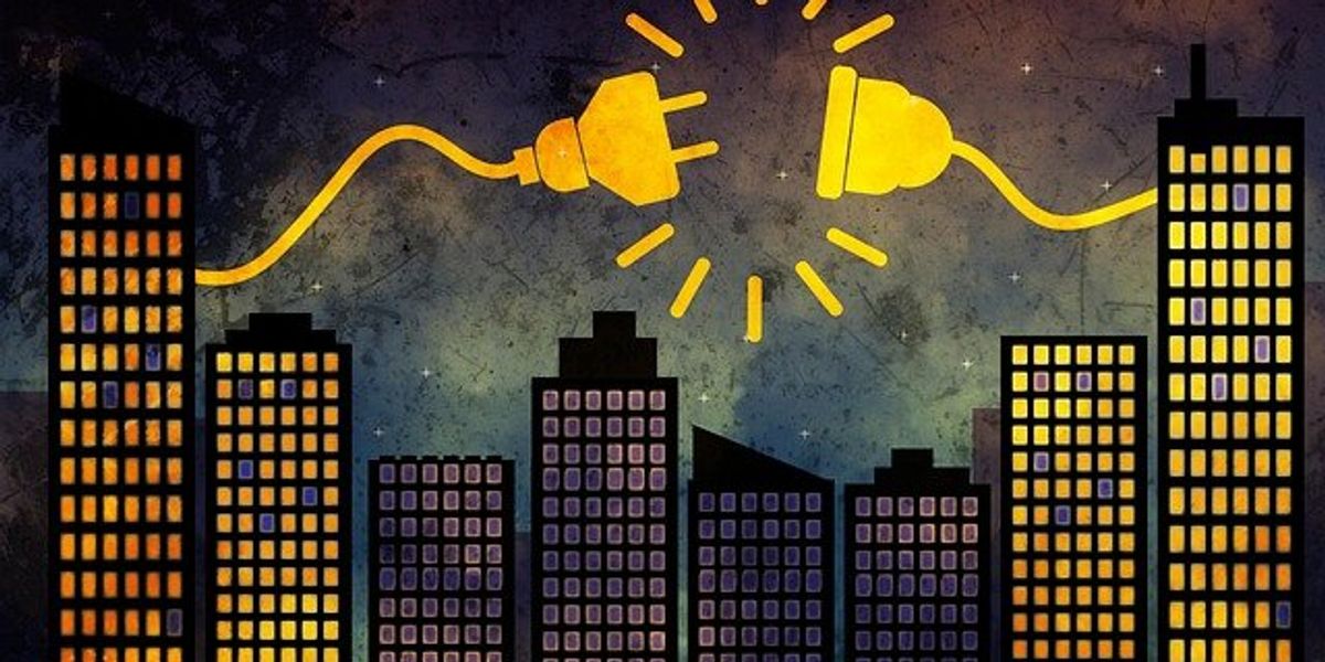 Graphic image of tall city buildings, some of which have lighting and some of which are in blackout.