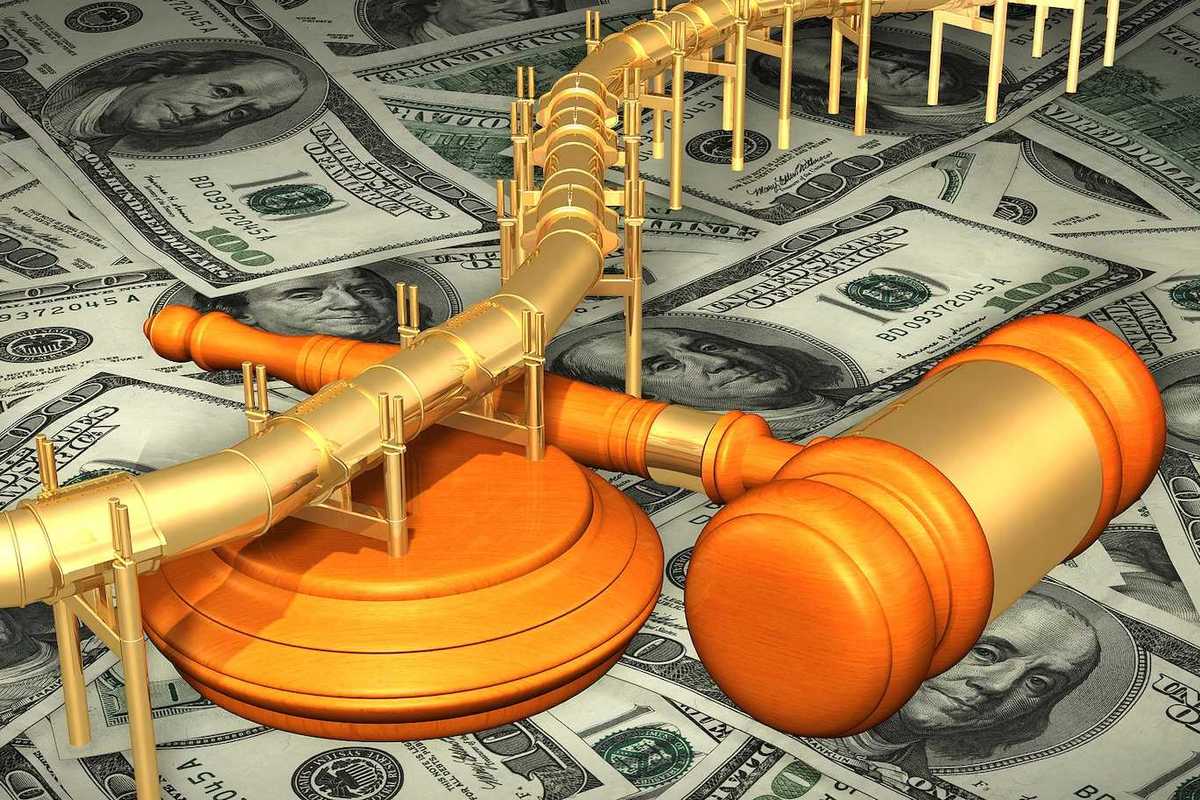 Graphic rendition illustrative of a golden fuel pipeline with a gavel superimposed over $100 bills